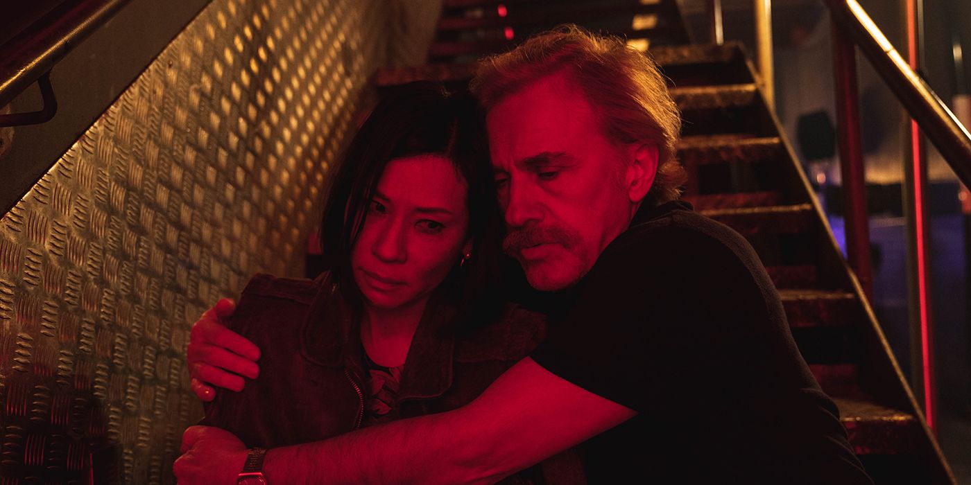 Christoph Waltz and Lucy Liu fit some snuggles in during Old Guy