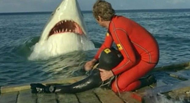 A shark attacks in Deep Blood 1990