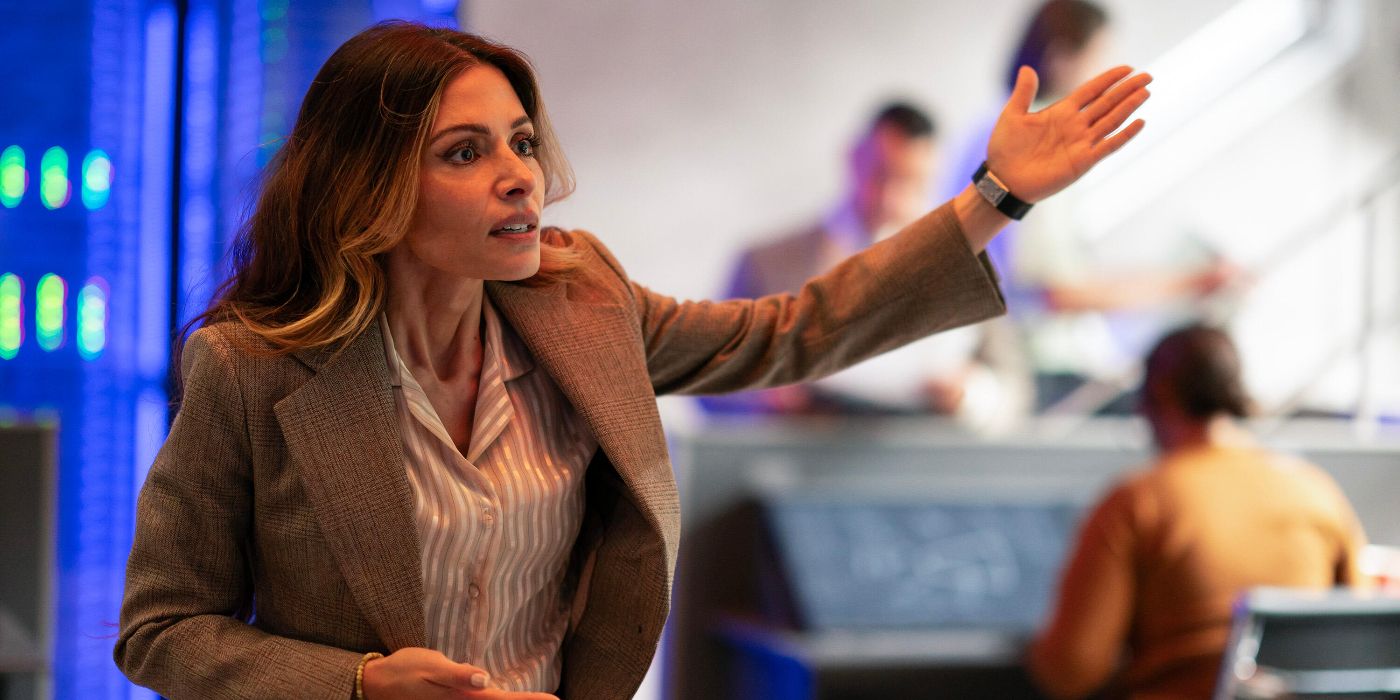 Sarah Shahi gesturing in Paradise Episode 6