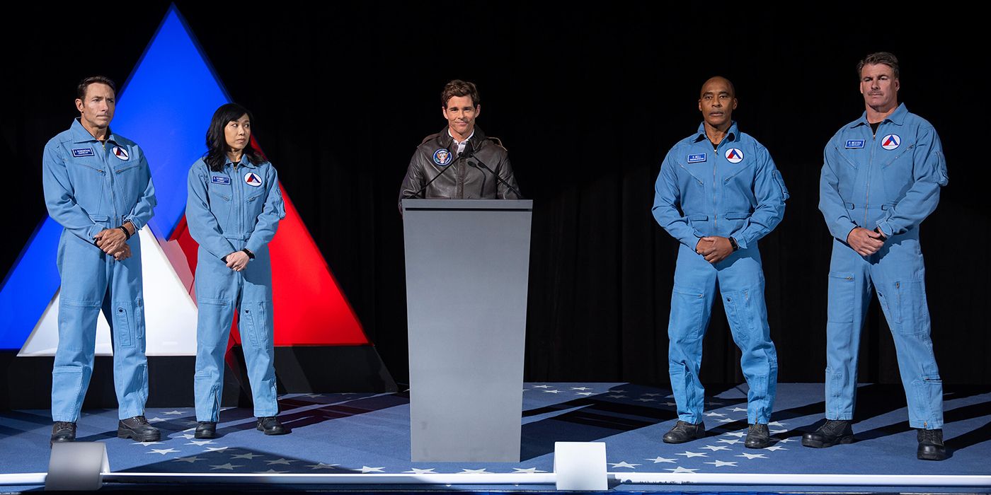 President Bradford (James Marsden) announcing an expedition team to search the surface in Paradise.