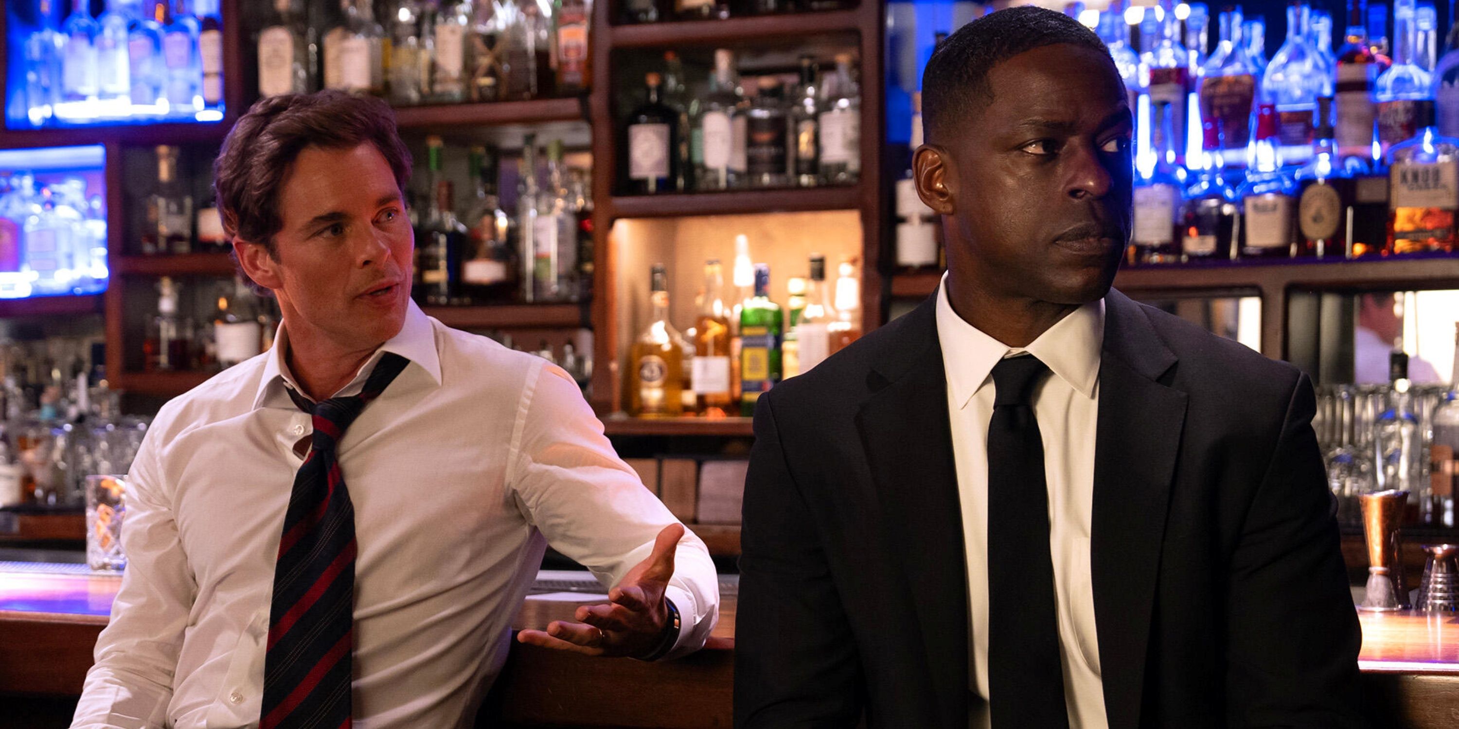 James Marsden as Cal Bradford sitting at a bar next to Sterling K. Brown as Xavier in the Hulu series Paradise