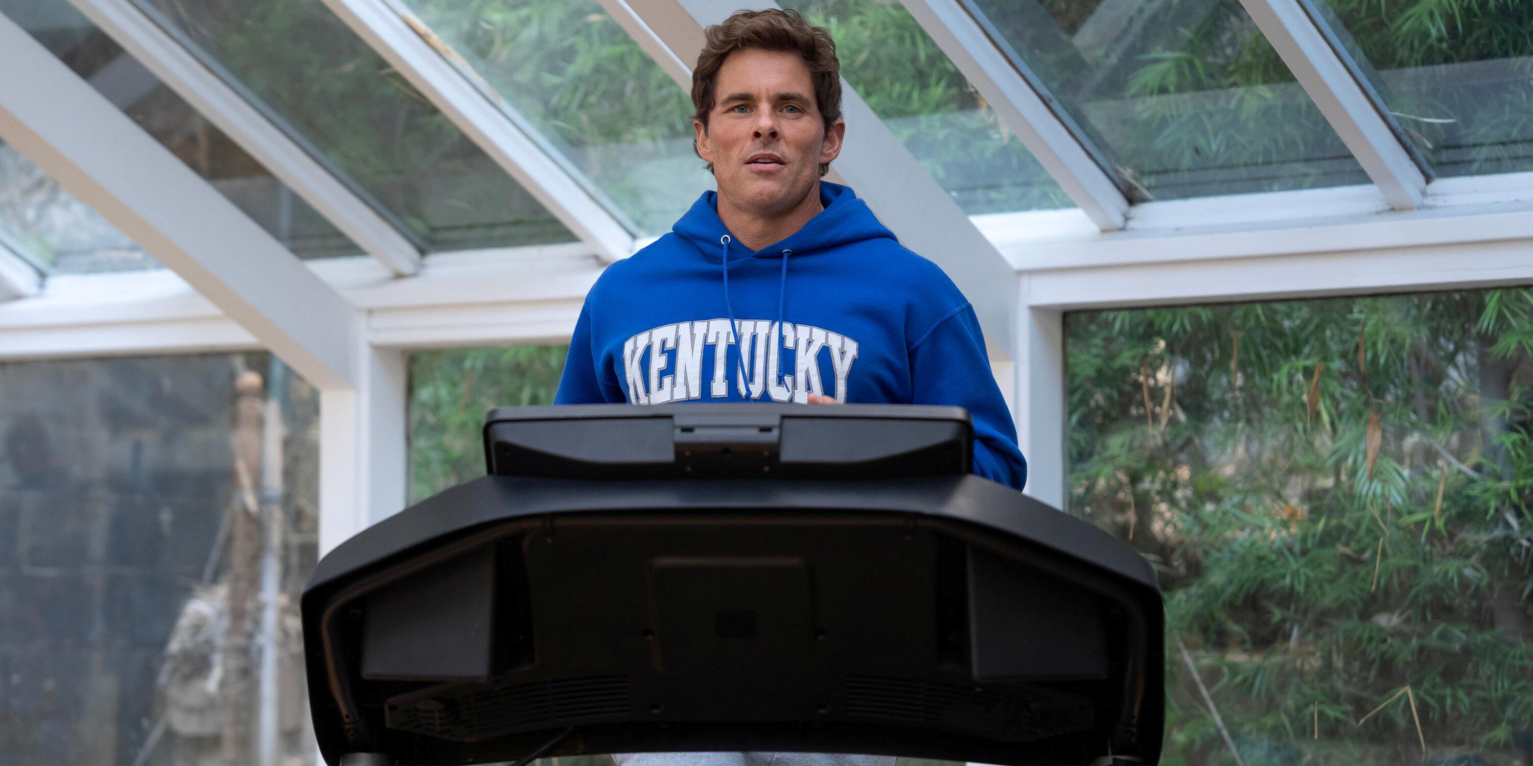 James Marsden as Cal Bradford in a Kentucky hoodie while on the treadmill in the Hulu series Paradise