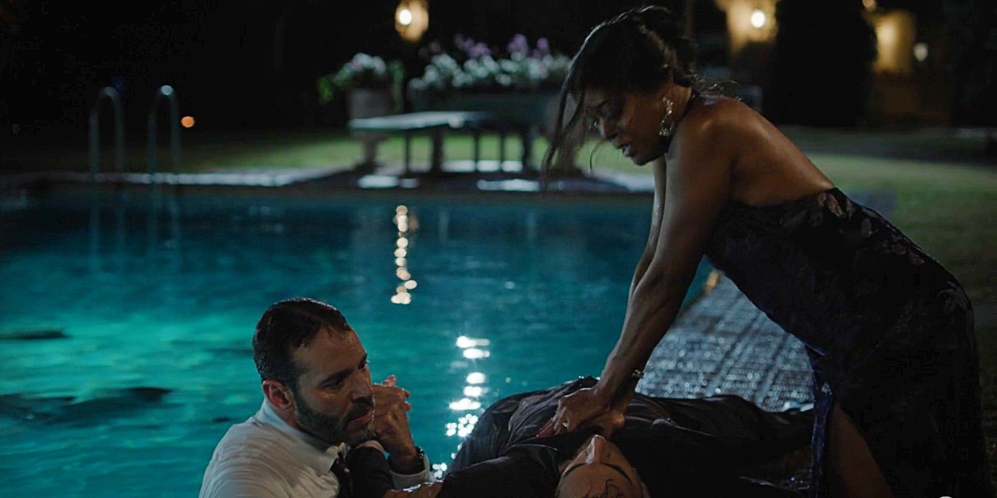 Daphne giving Oz CPR and Karadec holding him up beside a pool in the Season 1 finale of High Potential.