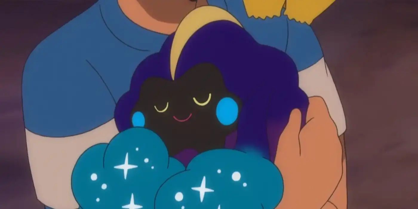 Ash holds Nebby the Cosmog in his arms while Pikachu rests on his shoulder