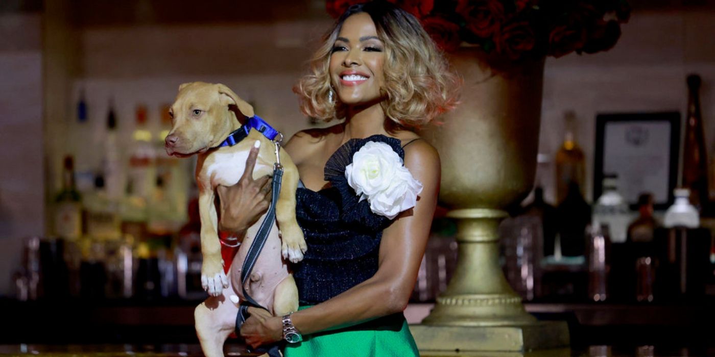 Stacey Rusch holds a puppy during her Struts for Strays event on 'The Real Housewives of Potomac.'