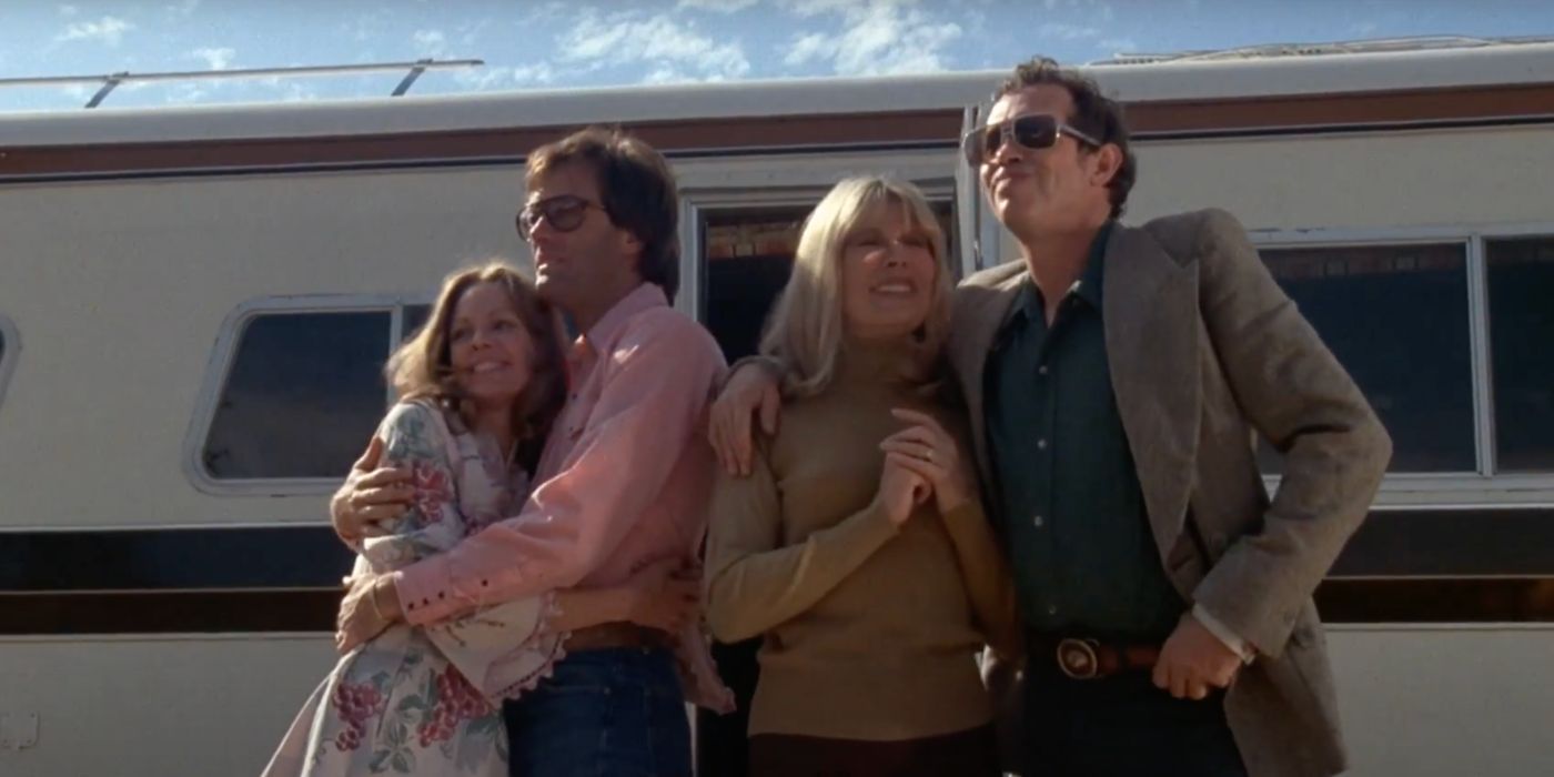 Lara Parker, Peter Fonda, Loretta Swit, and Warren Oates stand outside an RV in Race with the Devil (1975).