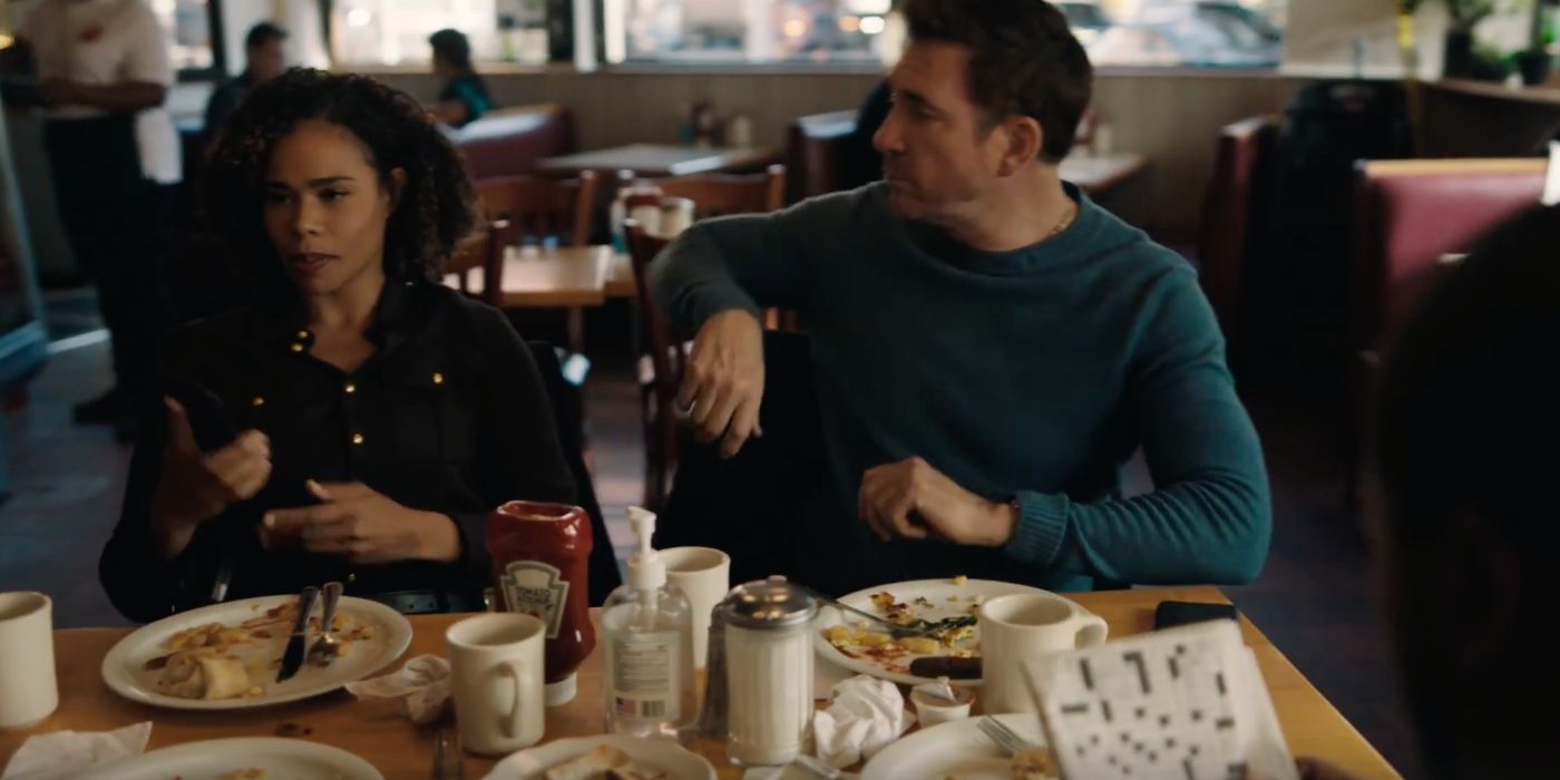 Dylan McDermott as Remy Scott and Roxy Sternberg as Sheryll Barnes having breakfast in 'FBI: Most Wanted'