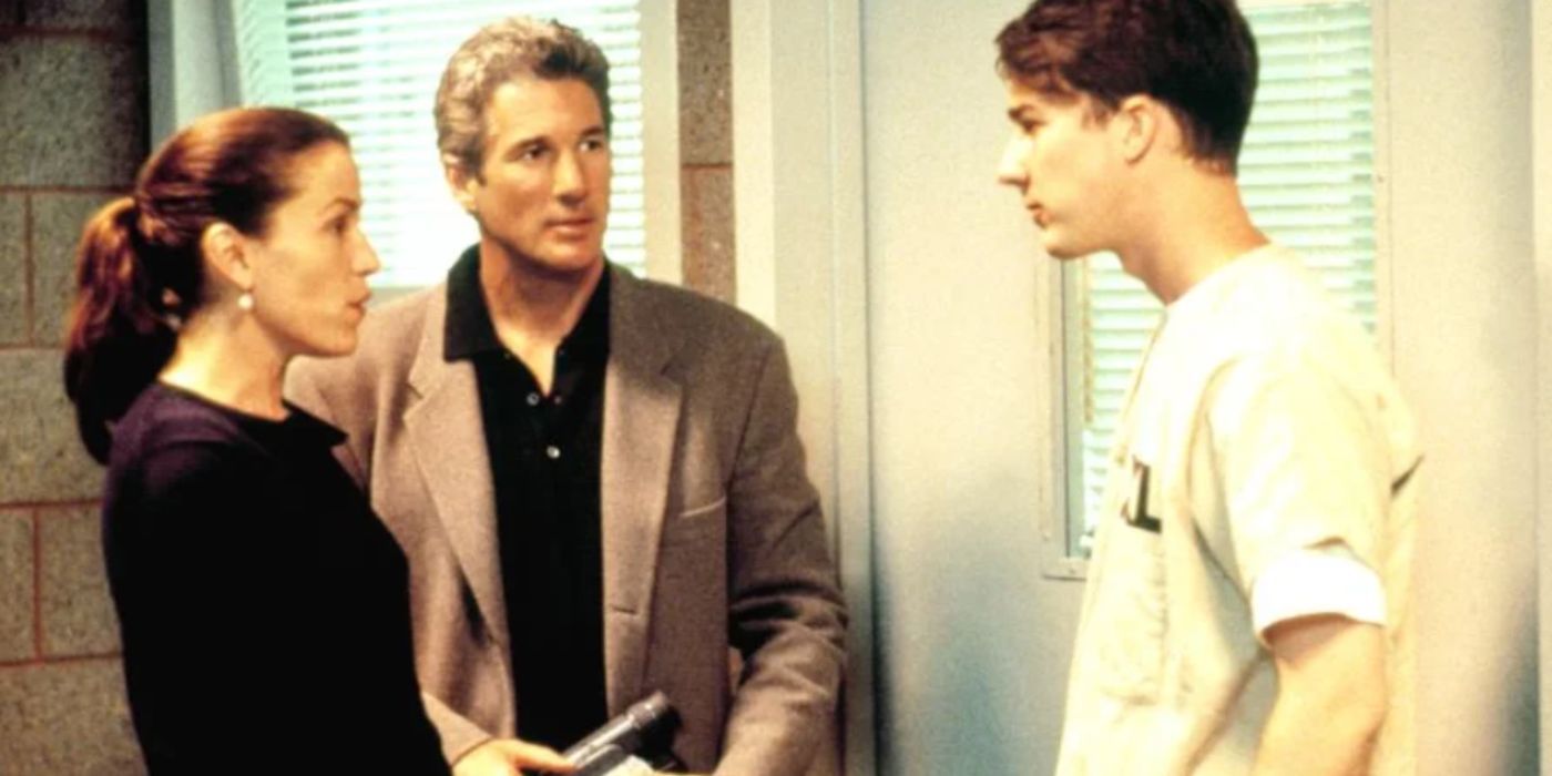 Frances McDormand, Richard Gere, Edward Norton as Dr. Molly, Martin, and Aaron standing in a jail cell in 'Primal Fear'