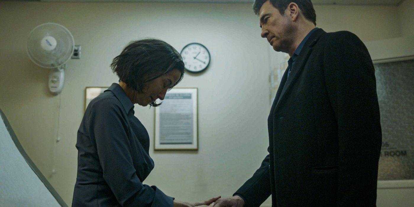 Dylan McDermott as Remy Scott comforting Wendy Moniz as April Brooks in FBI: Most Wanted