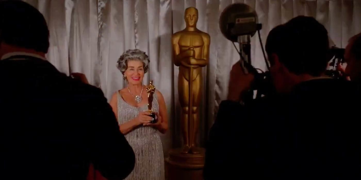 Joan Crawford (Jessica Lange) shows off an Oscar as part of her ongoing rivalry in Feud: Bette and Joan.