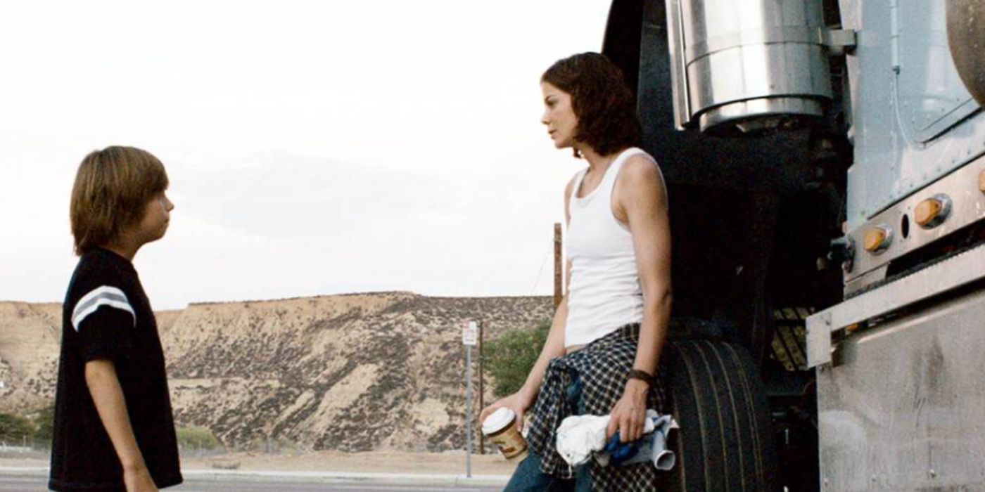 Jimmy Bennett and Michelle Monaghan as Peter and Diane standing outside a truck in &lsquo;Trucker&rsquo;