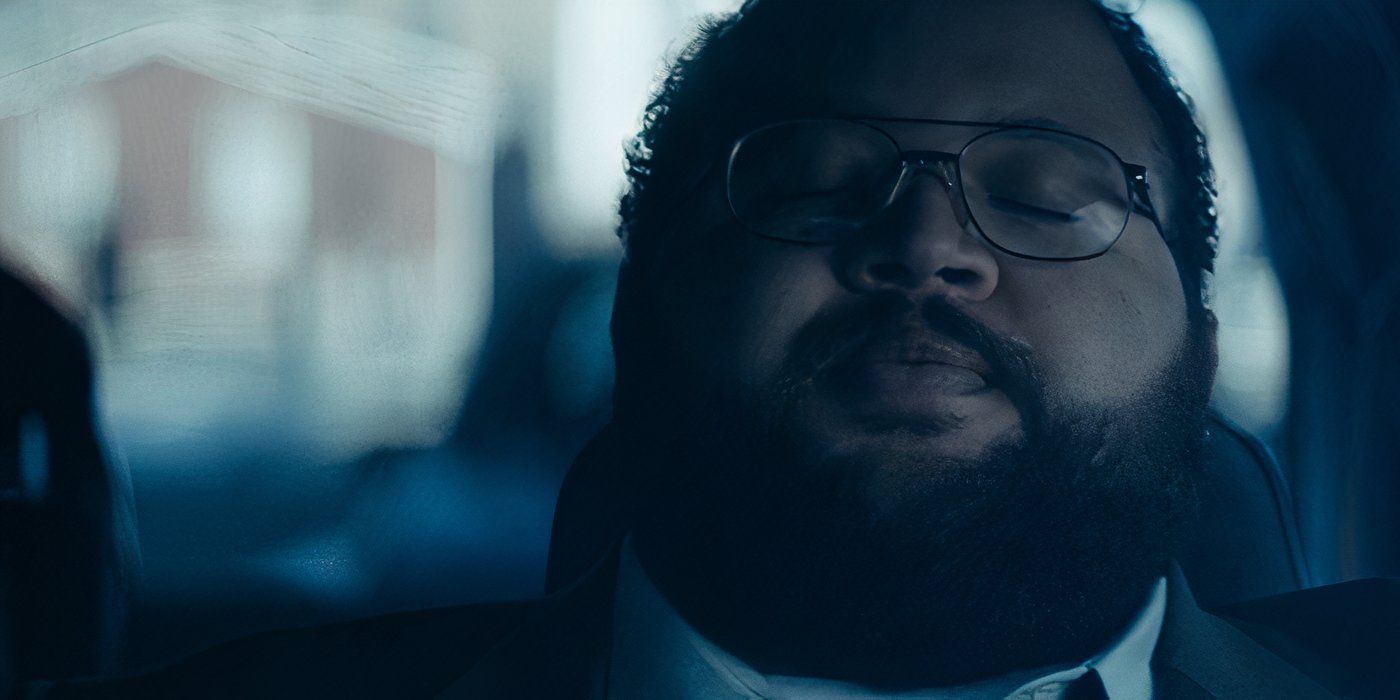 Dylan G.&rsquo;s outie (Zach Cherry) sits in his car with an exhausted look on his face in &lsquo;Severance&rsquo; on Apple TV+.