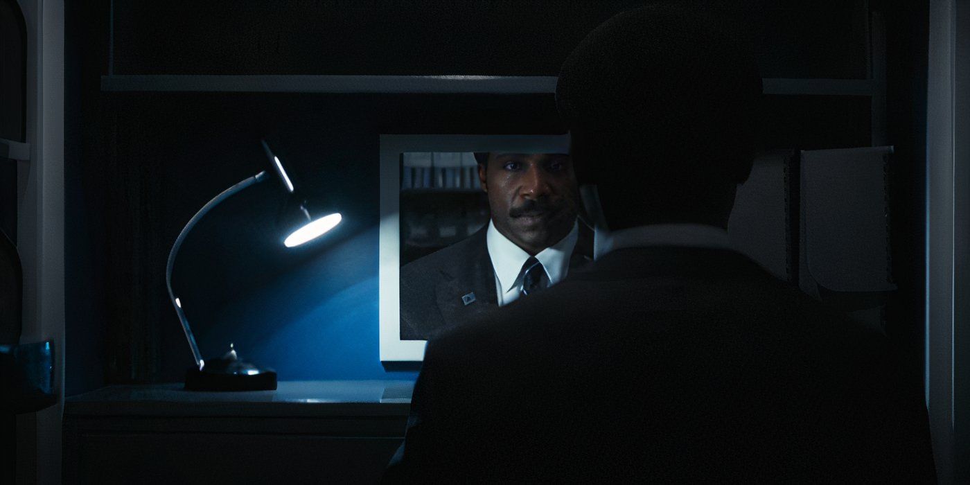 Seth Milchick (Tramell Tillman) stands in front of a mirror before rehearsing a new mantra in Severance on Apple TV+.
