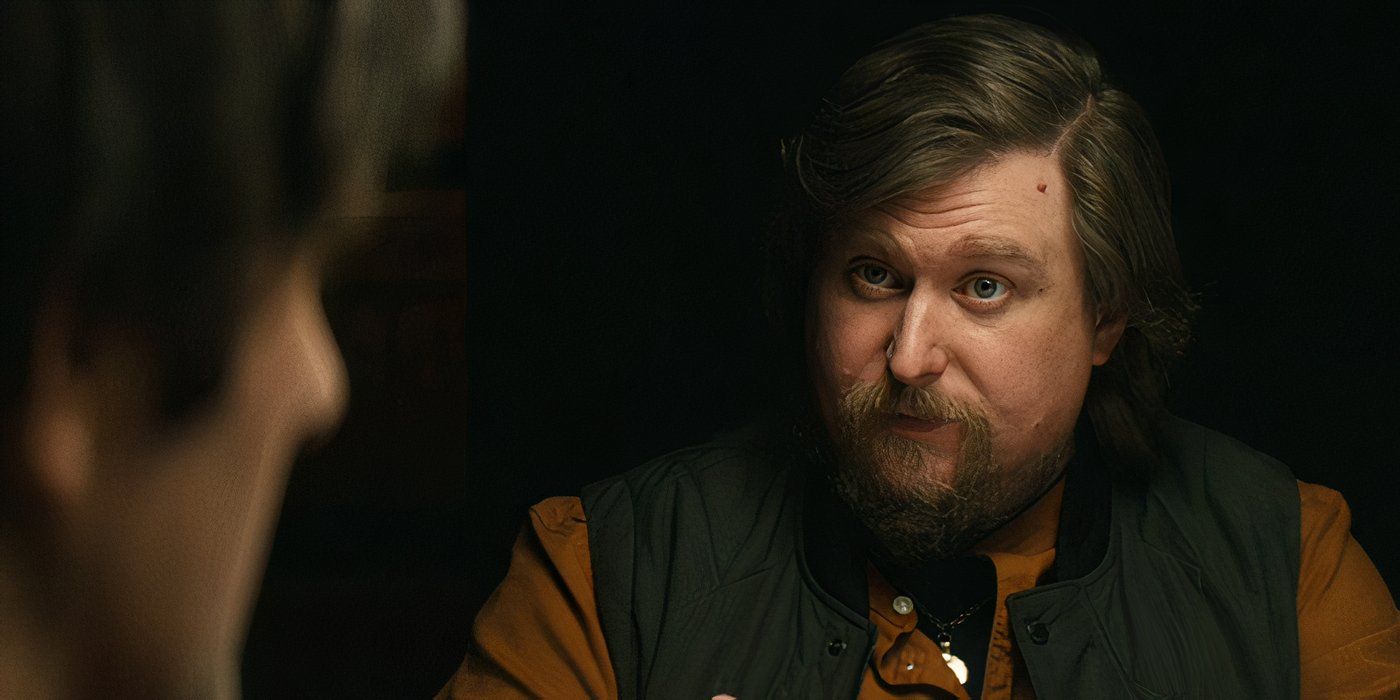 Ricken Hale (Michael Chernus) makes an apology to his brother-in-law Mark (Adam Scott) at dinner in Severance on Apple TV+.