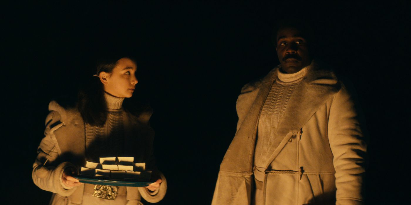 Sarah Bock and Tramell Tillman at the fire in Severance Season 2 Episode 4