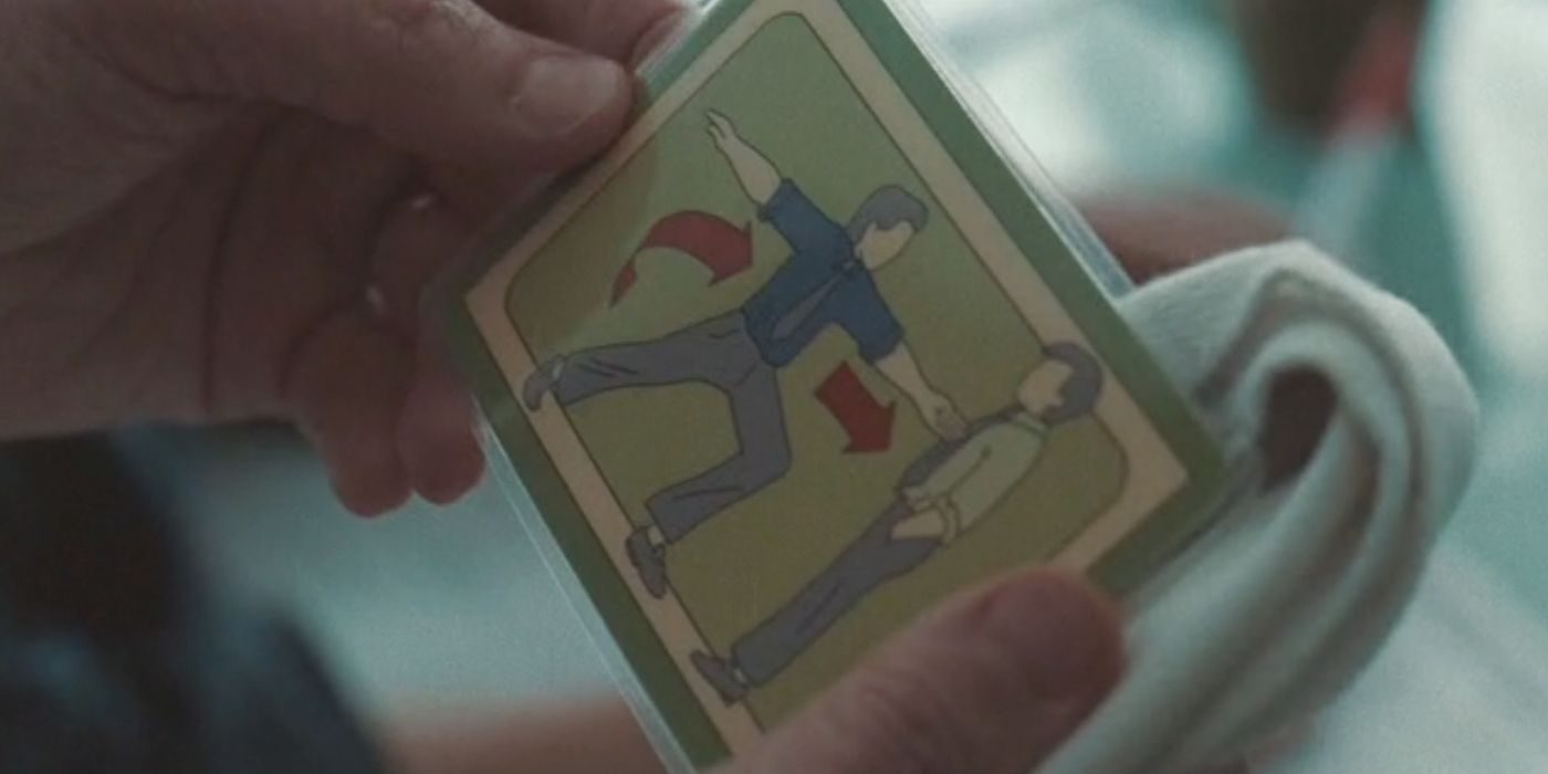 A card of a man fighting himself in Severance.