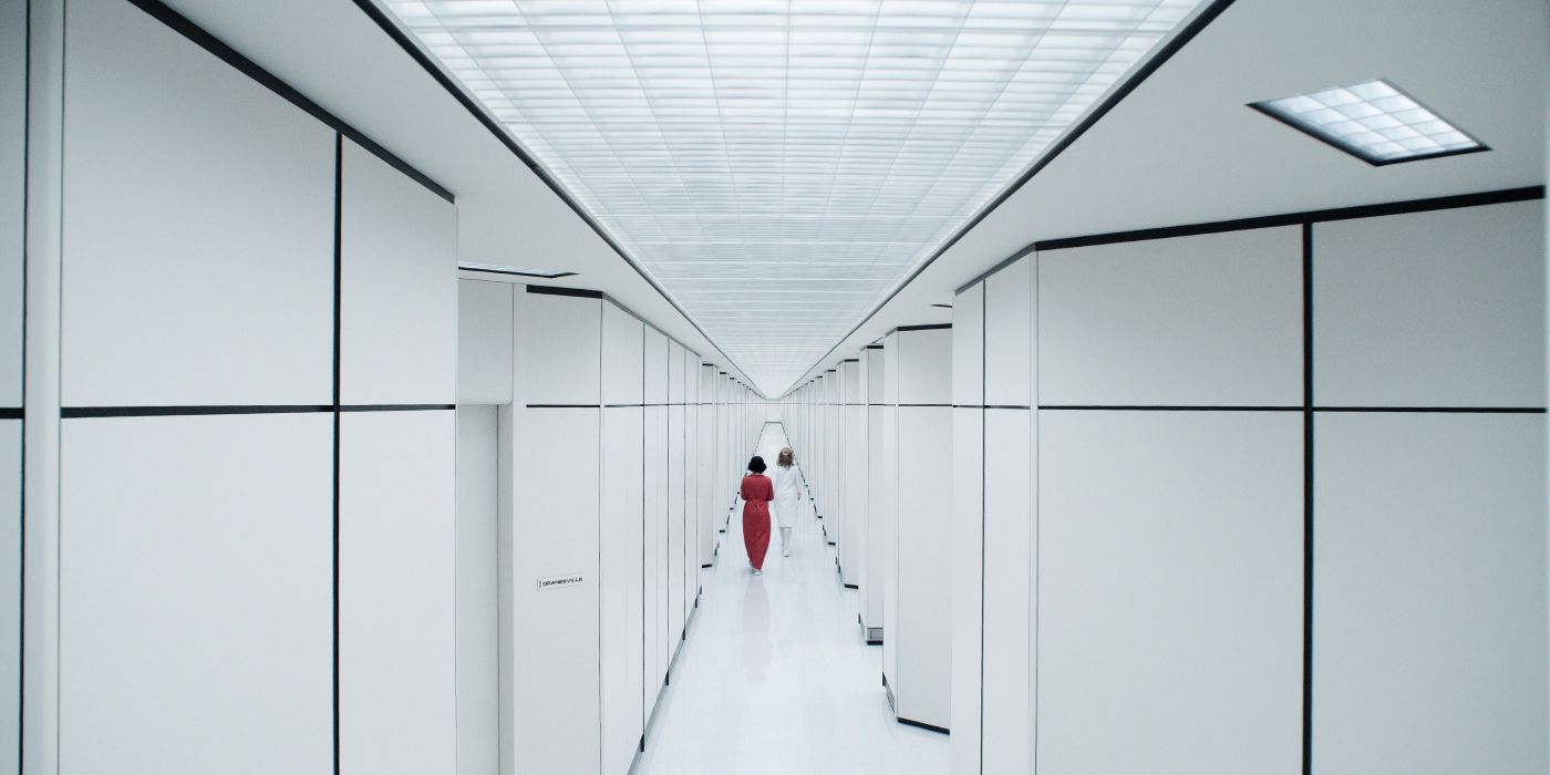 Dichen Lachman and Sandra Bernhard walking through Lumon hallways