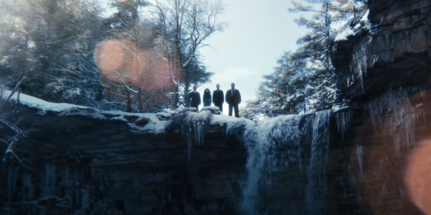 The MDR &ldquo;twins&rdquo; look down while standing on top of a waterfall in Severance Season 2.