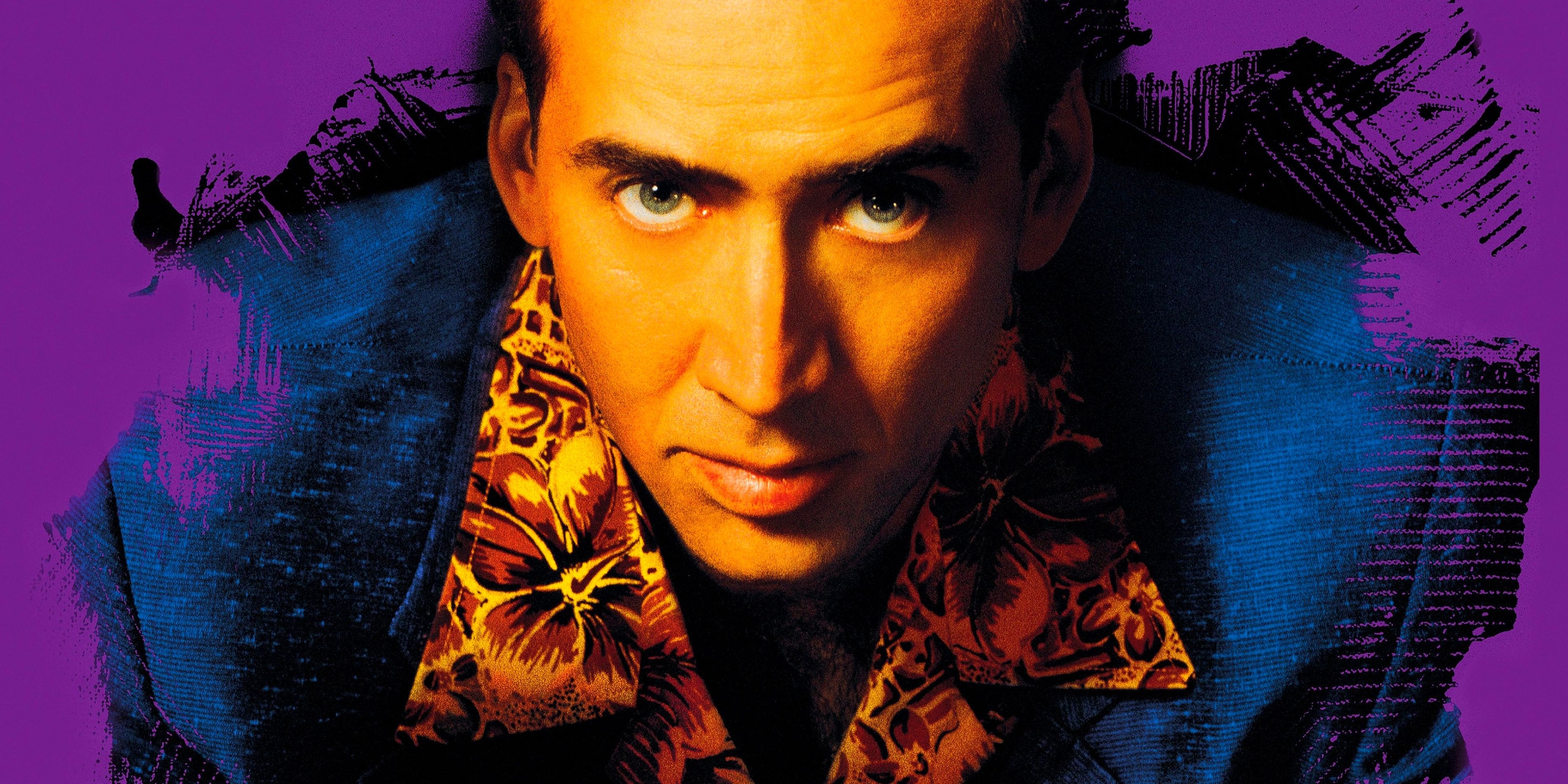 Nicolas Cage as Rick Santoro, dressed in a colorful suit and looking directly at the camera in front of a purple backdrop.