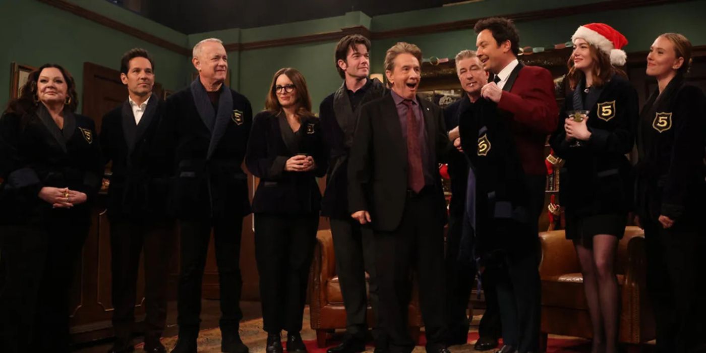 SNL cast members in their five timer&rsquo;s club jackets on stage on SNL.