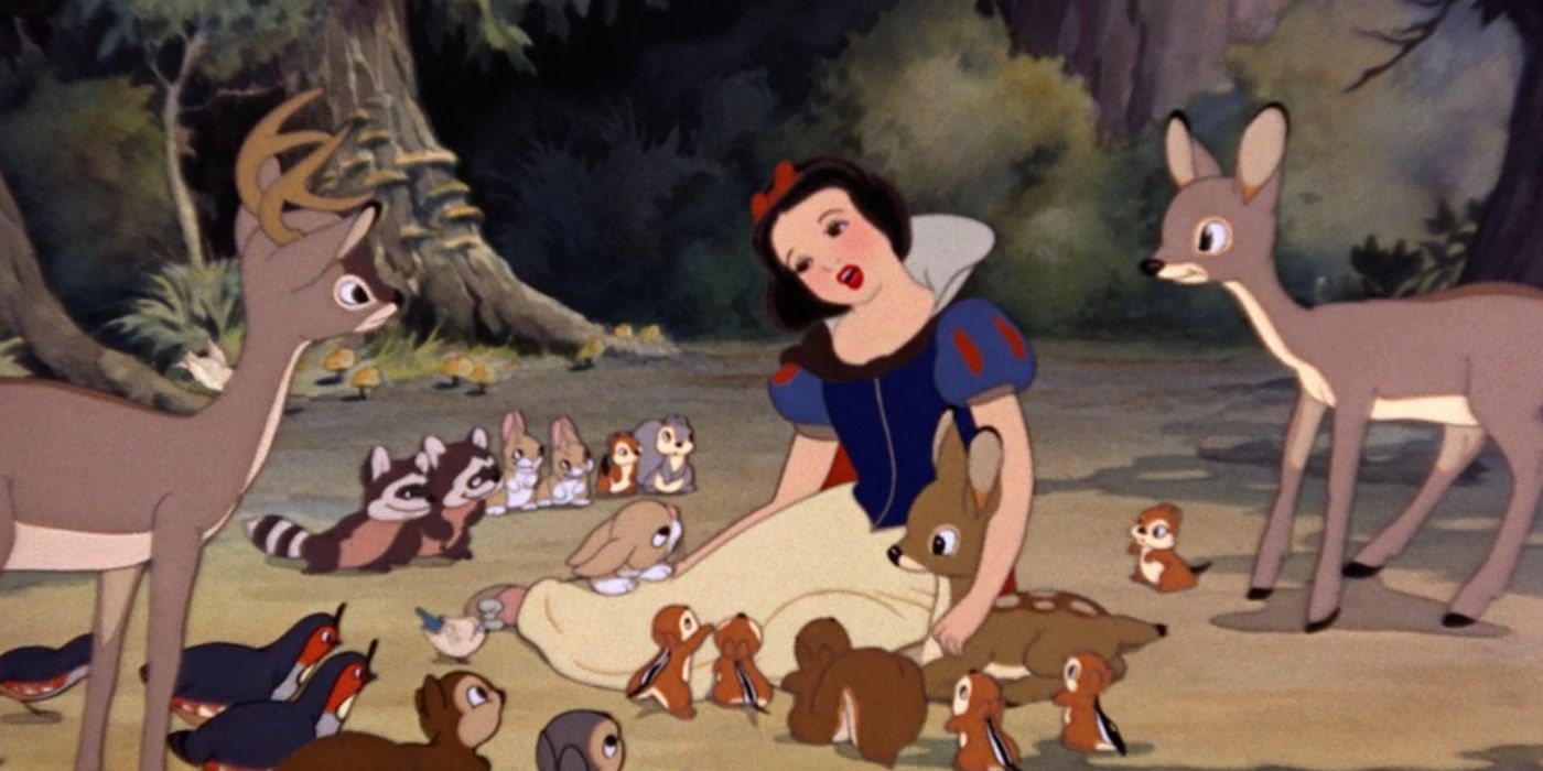 Snow White (Adriana Caselotti) sings to a group of forest animals in 'Snow White and the Seven Dwarfs'.