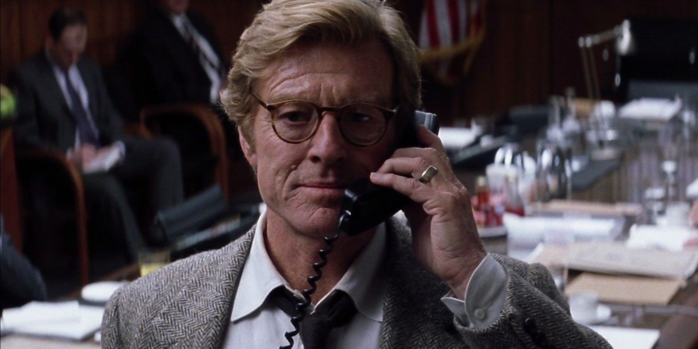 Robert Redford&rsquo;s Nathan Muir takes a important call during &lsquo;Spy Game&rsquo;