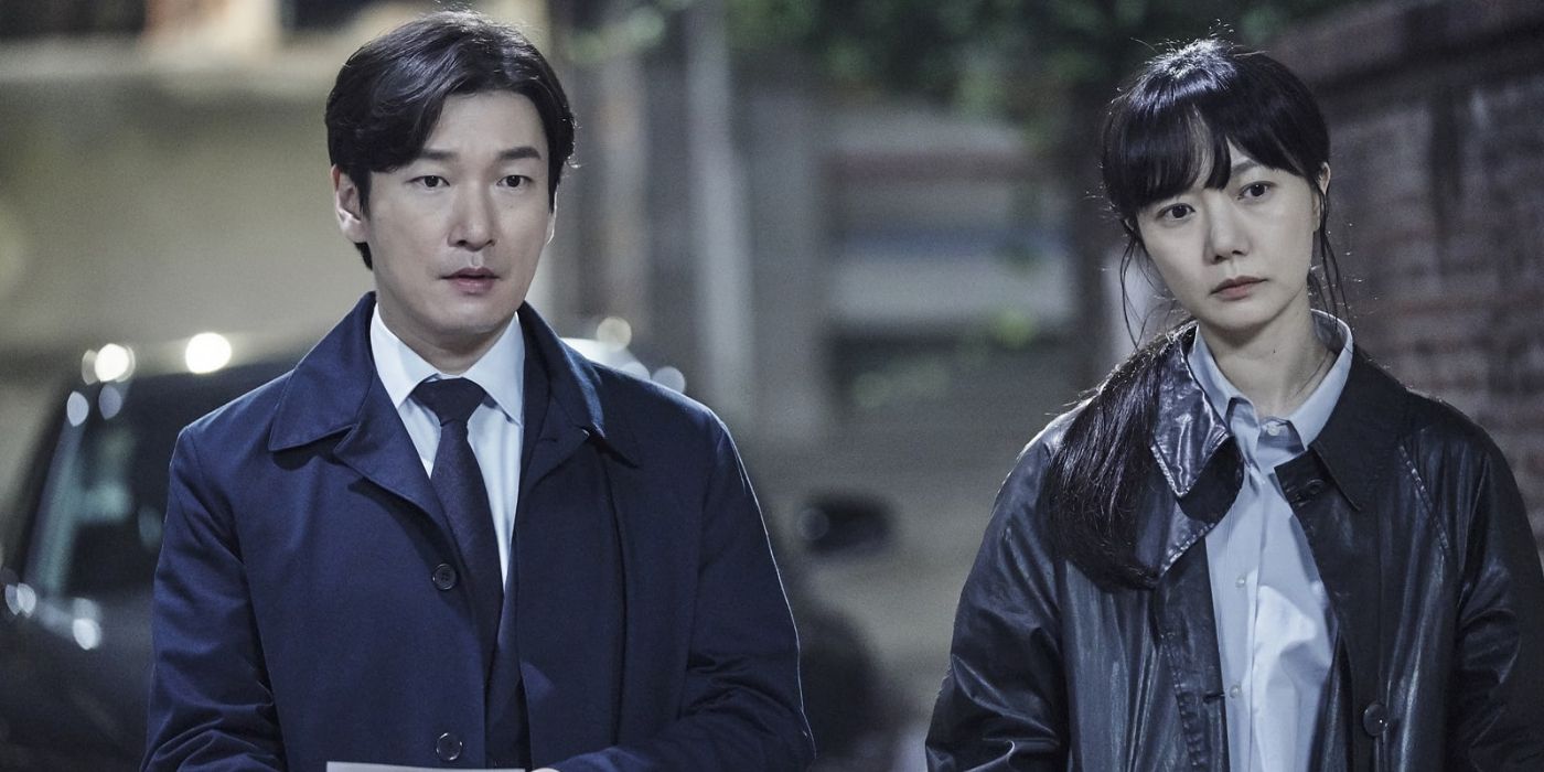 Cho Seung-woo and Bae Doona standing shoulder to shoulder in Stranger.