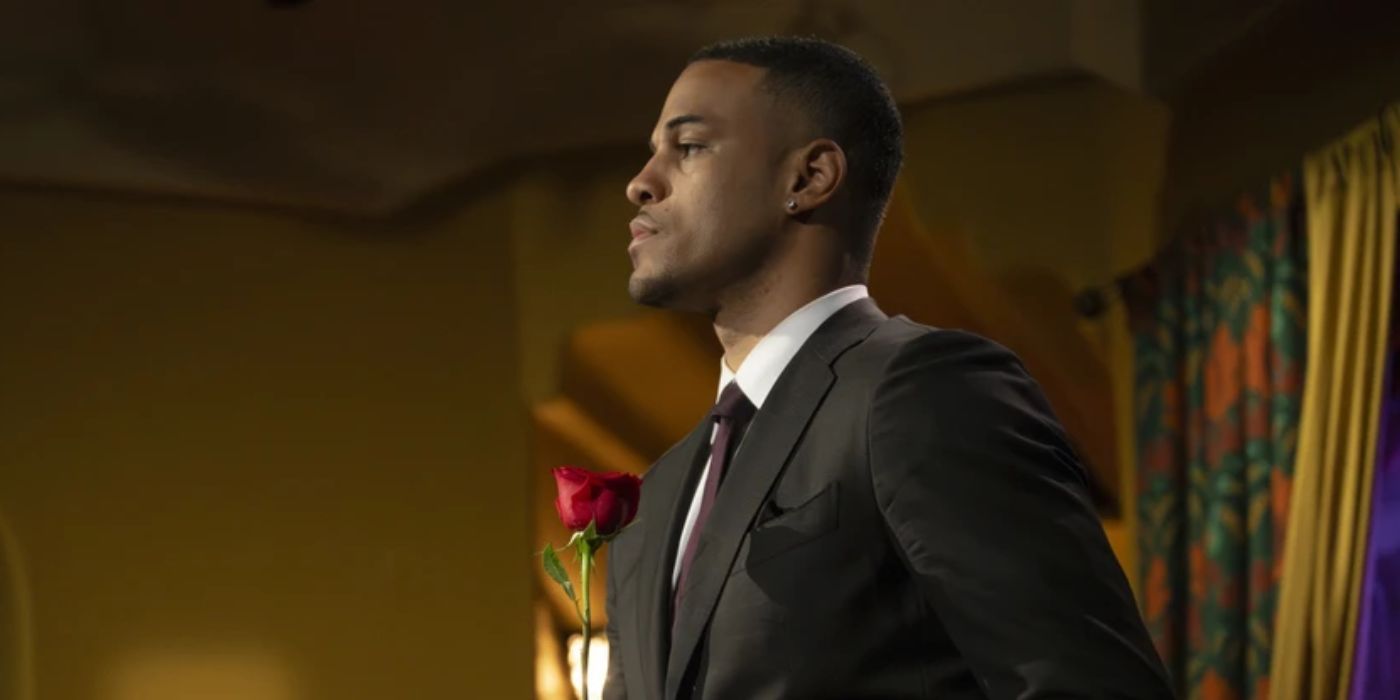 Grant Ellis holding a rose in 'The Bachelor' Season 29.