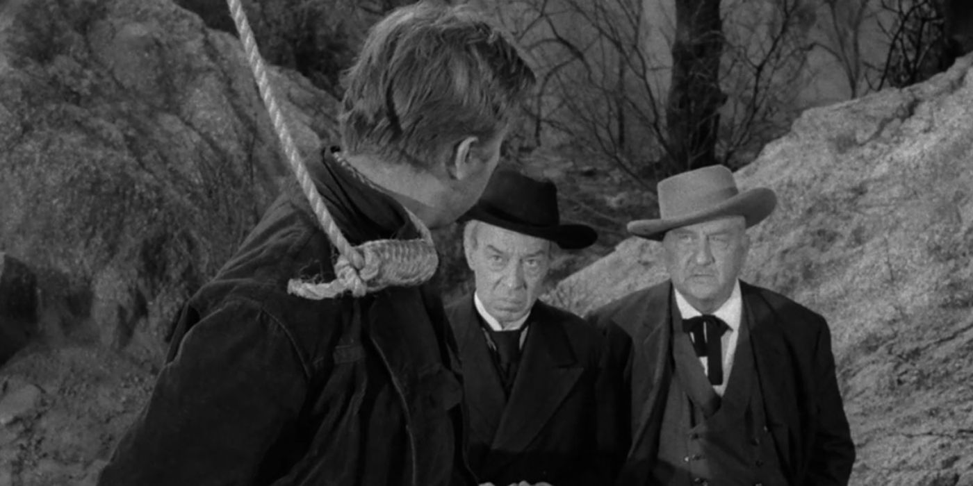 A man on a horse with hands tied behind his back and noose around his neck talks to others in The Twilight Zone.