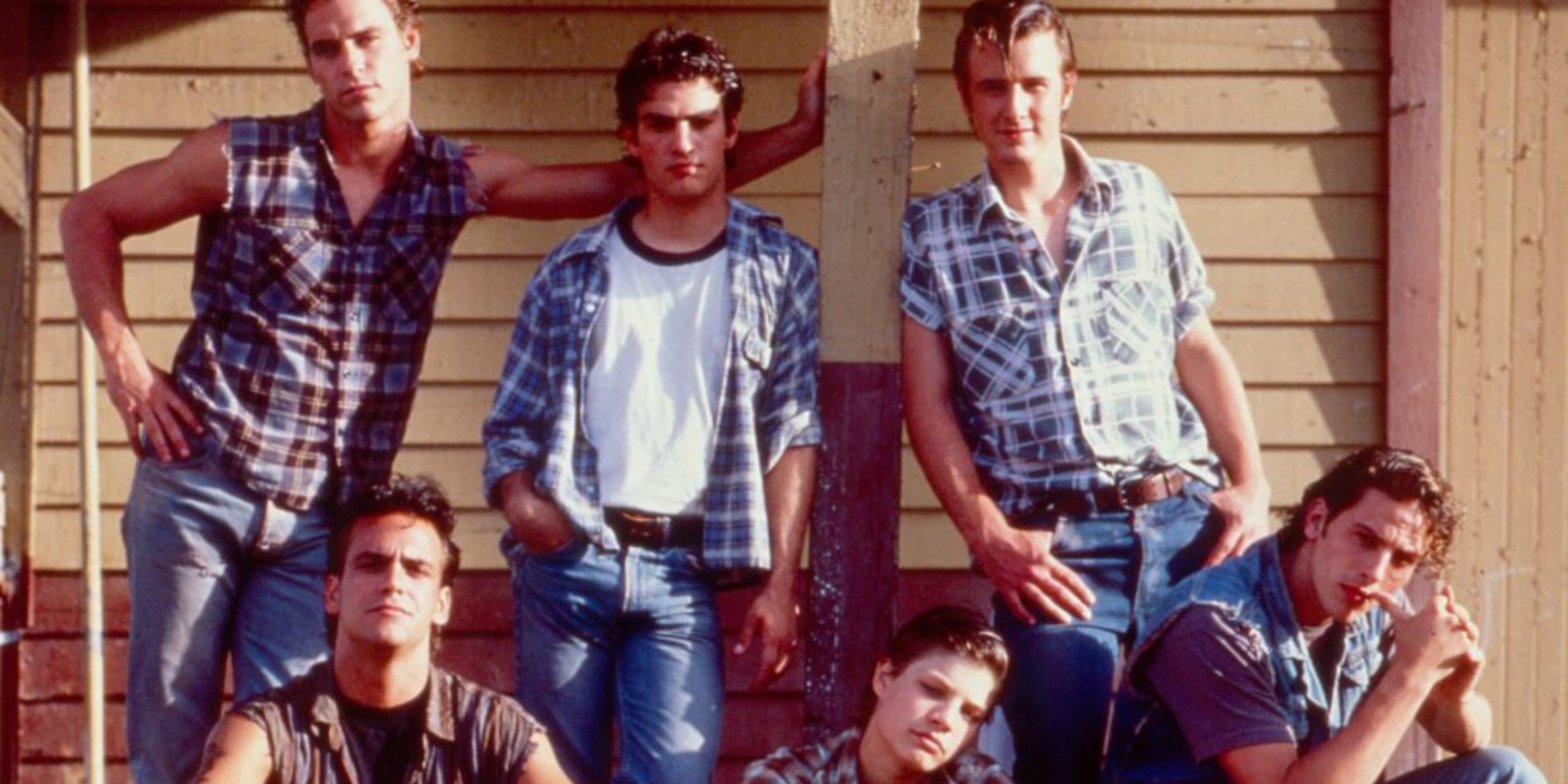 The cast of The Outsiders show from 1990