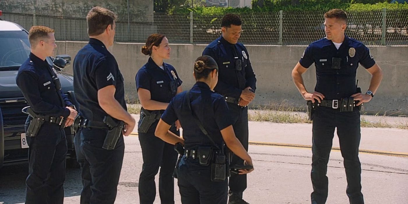 The police officers of &lsquo;The Rookie&rsquo; outside, standing in a circle