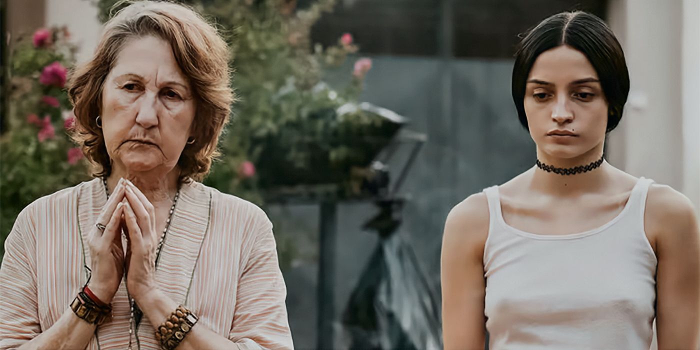 Dolores Oliverio standing next to Luisa Merelas in The Virgin of Quarry Lake