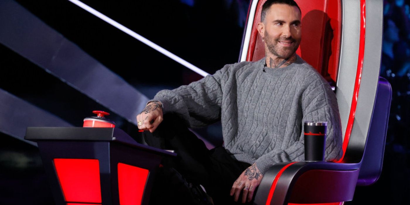 Adam Levine smiles from his chair on 'The Voice' Season 27.