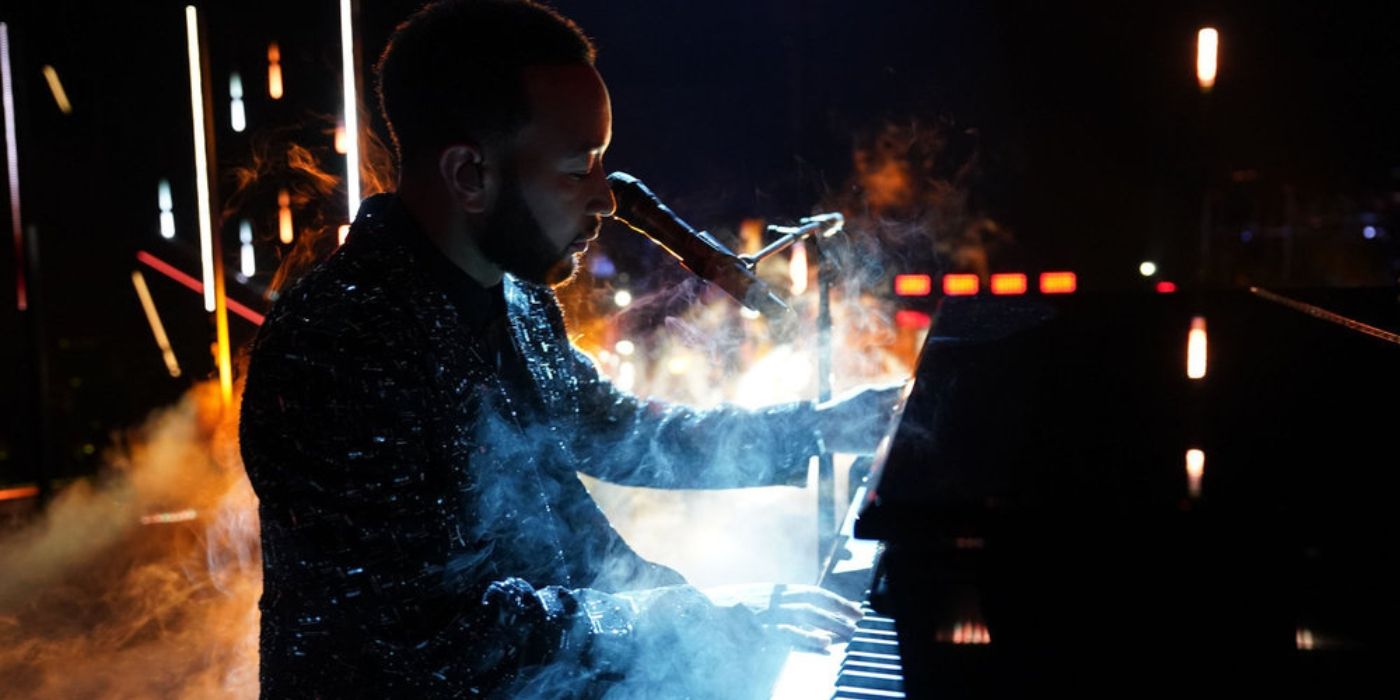 John Legend plays through the smoke during 'The Voice' Season 27 premiere.