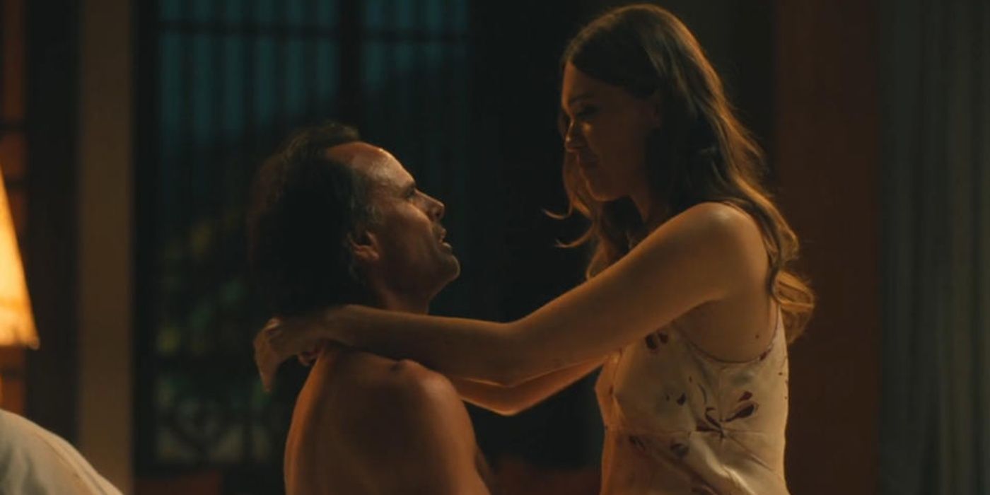 Walton Goggins as Rick in bad with Aimee Lou Wood as Chelsea sitting on his lap in The White Lotus Season 3