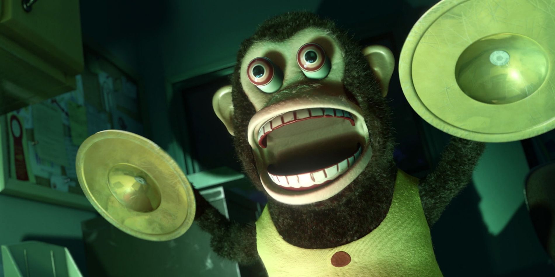 The Musical Jolly Chimp cymbal-banging monkey from 'Toy Story 3' with its mouth open, preparing to play.