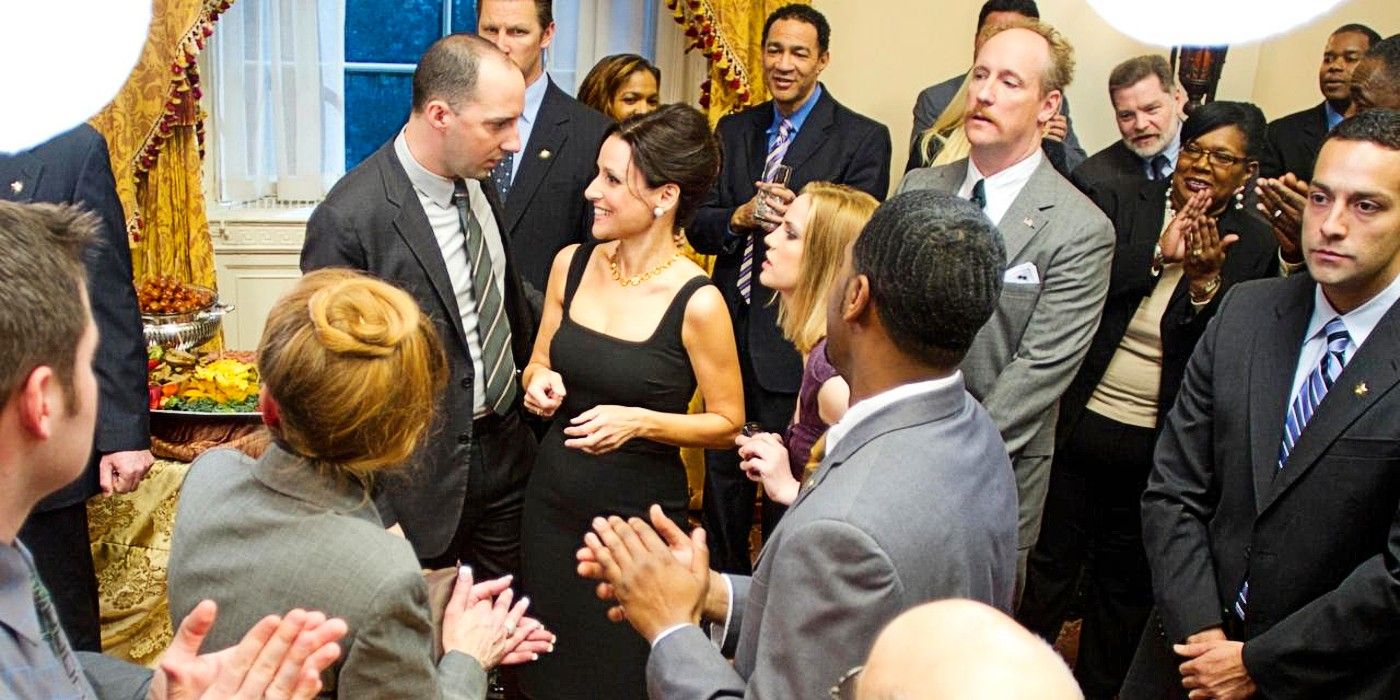 Selina, Gary, Amy, and Mike surrounded by people at a fundraiser in the pilot episode of Veep