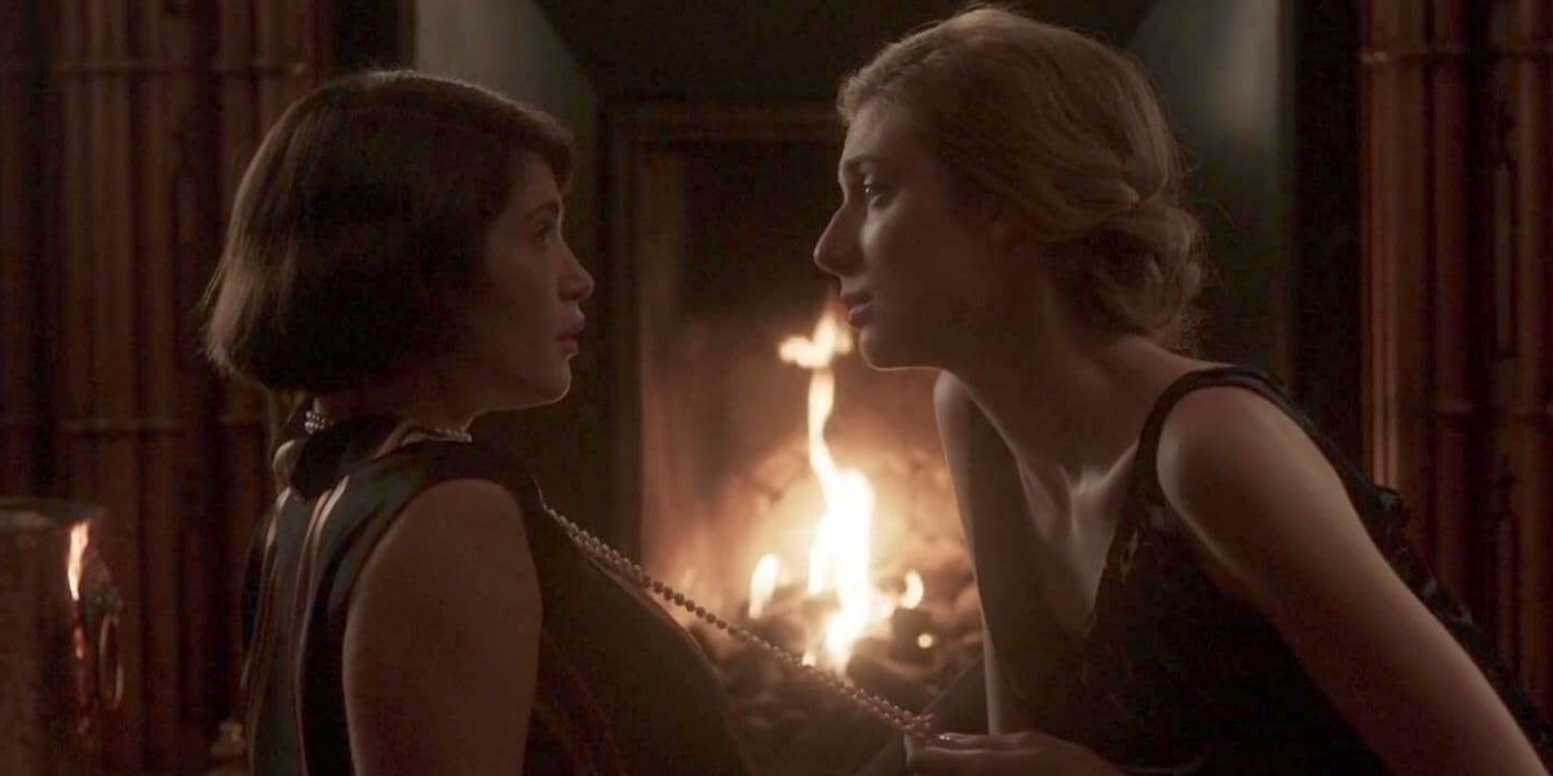 Vita (Gemma Arterton) and Virginia (Elizabeth Debicki) testing their intimacy by the fireplace in &lsquo;Vita &amp; Virginia&rsquo;.