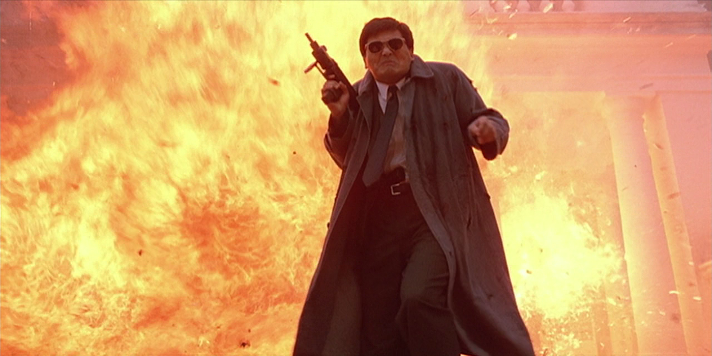 Chow Yun-fat in front of a big explosion in A Better Tomorrow II