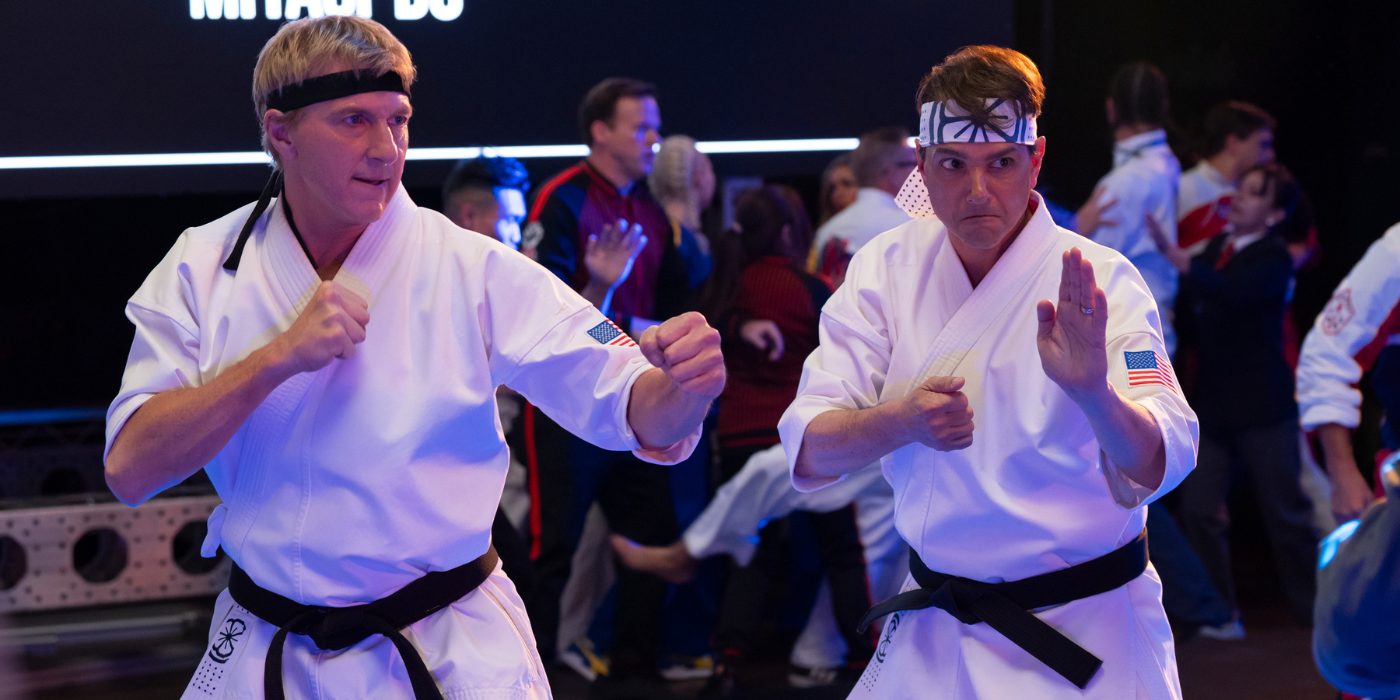 William Zabka as Johnny Lawrence and Ralph Macchio as Daniel LaRusso in in Cobra