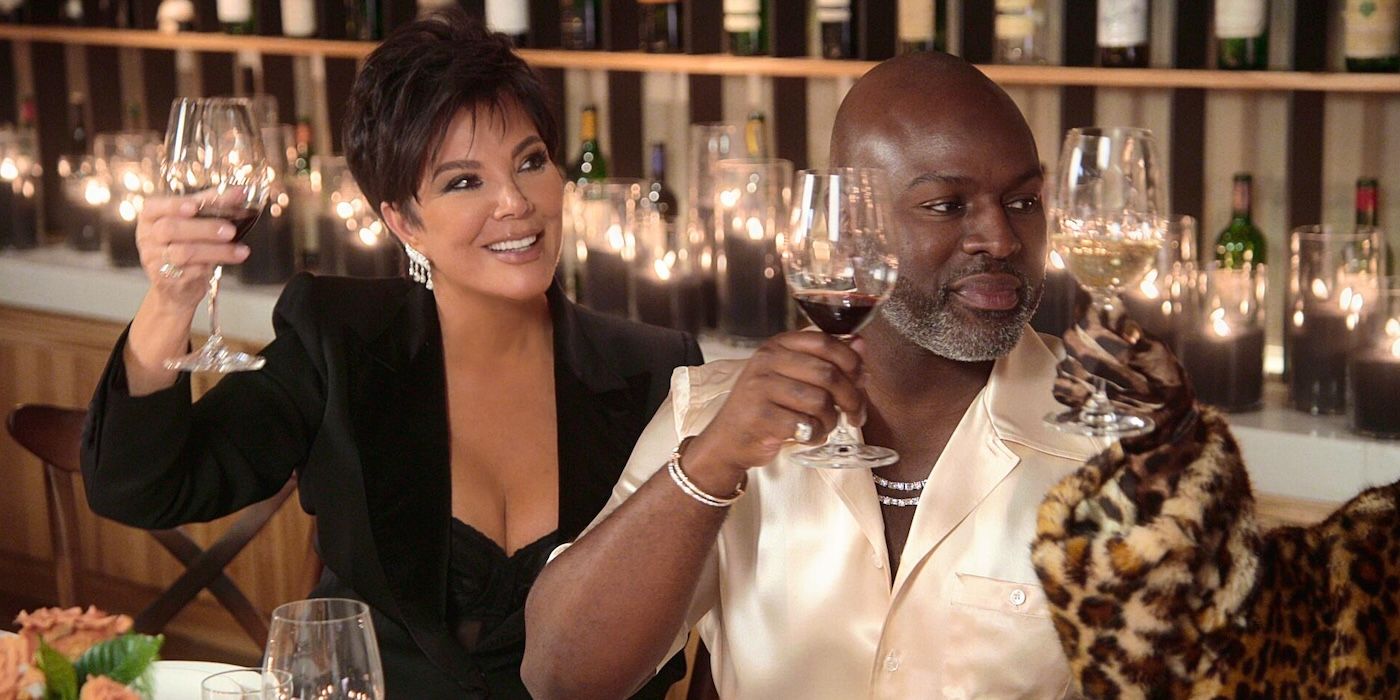 Kris Jenner and Corey Gamble raise their wine glasses in a toast on 'The Kardashians'