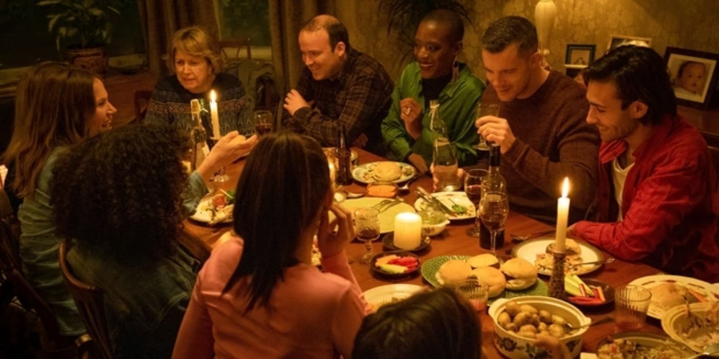 The Lyons family sits around a table in Years and Years.