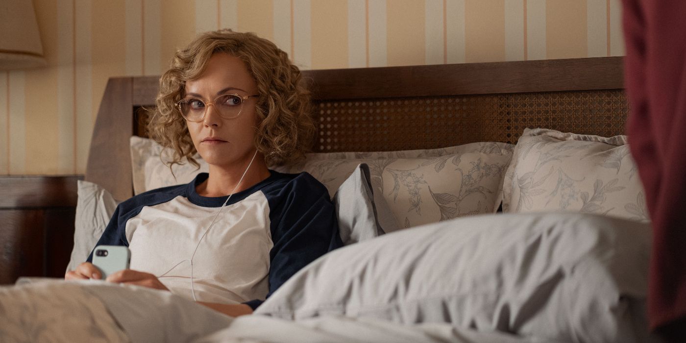 Christina Ricci sitting in bed in Yellowjackets Season 3 Episode 1