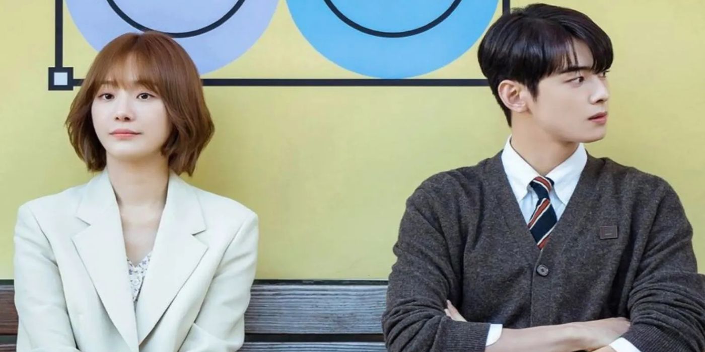 Han Hae-na and Jin Seo-won sitting on a bench together in A Good Day to Be a Dog