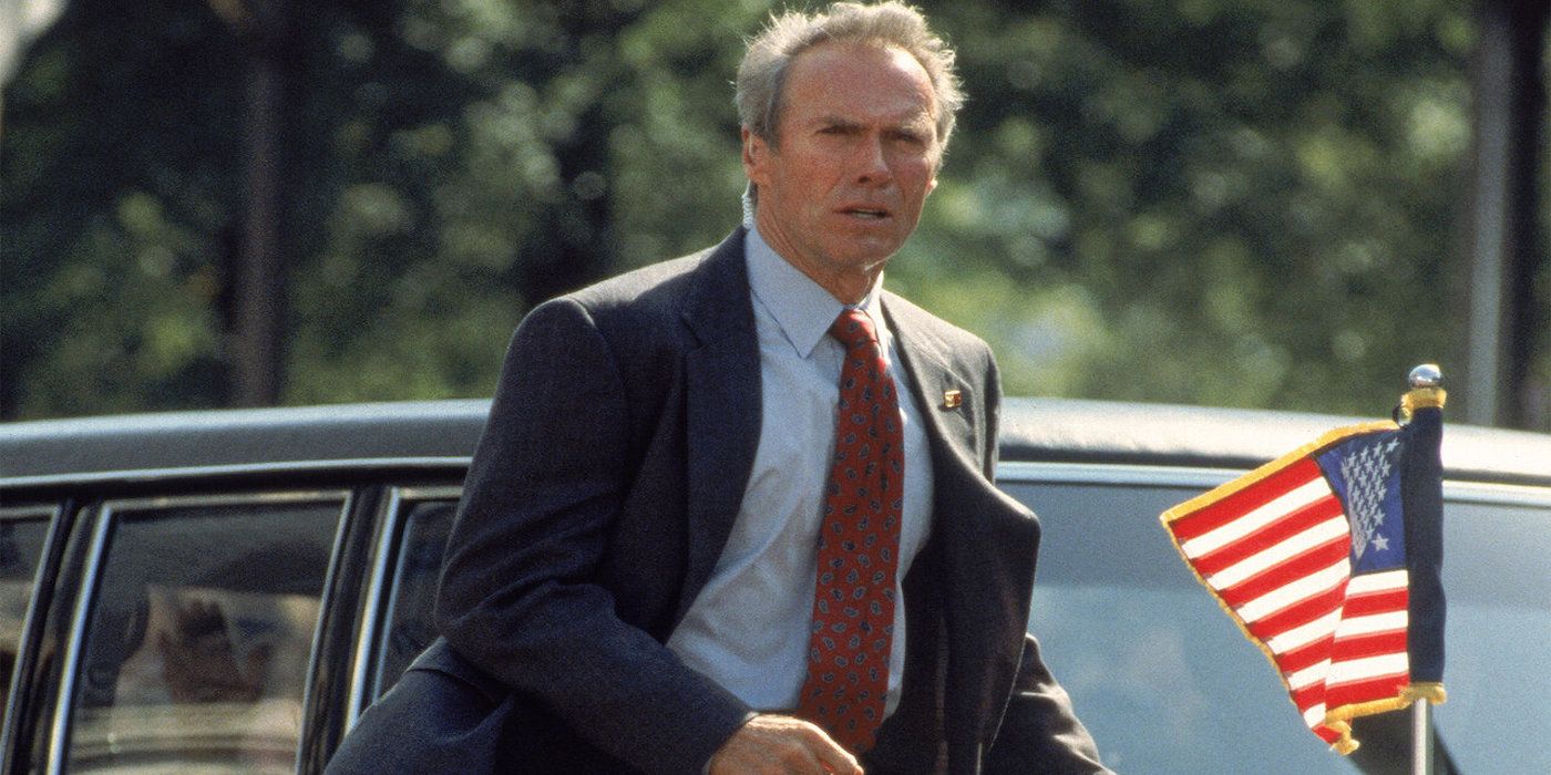 Clint Eastwood as Frank Horrigan running by Presidential limo in In the Line of Fire.