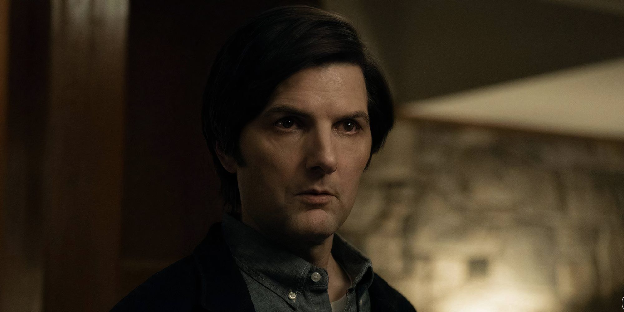 Adam Scott as Mark Scout in Severance looking attentive