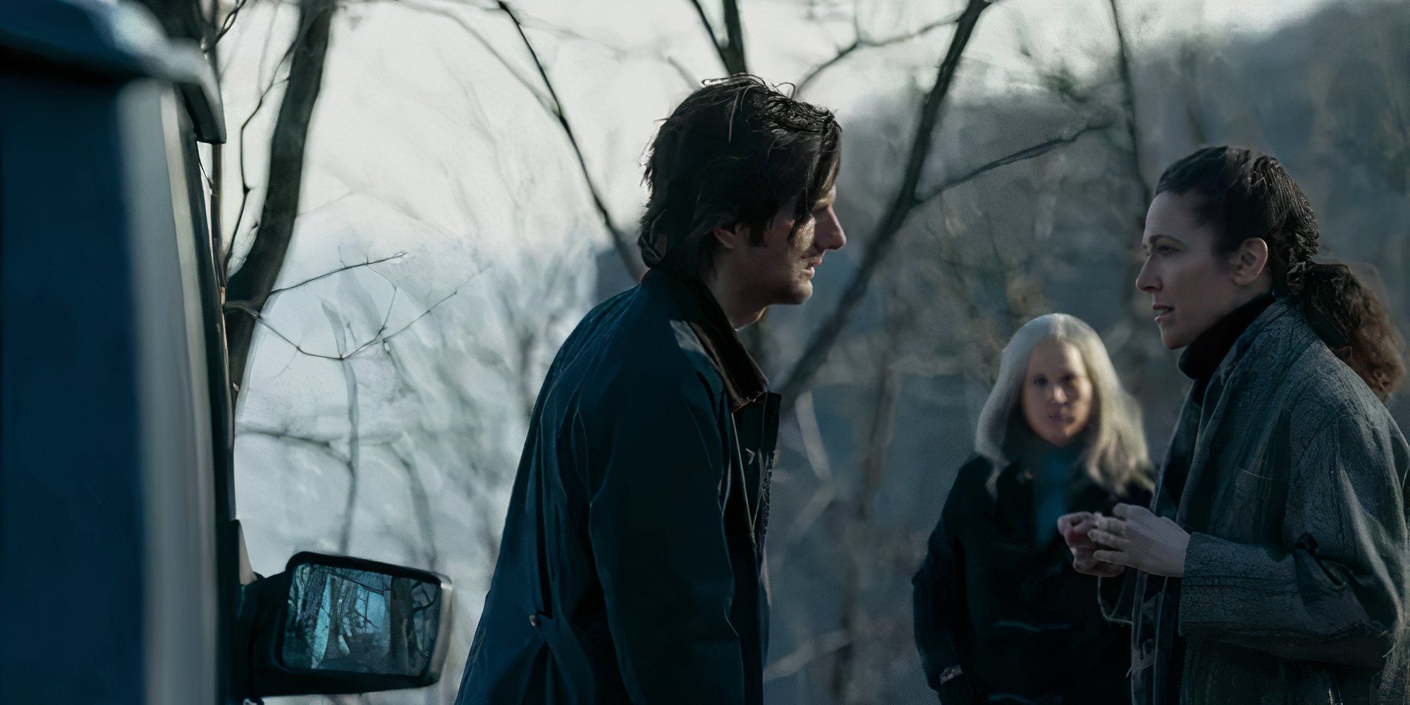 Adam Scott as Mark Scout looking at Jen Tullock as Devon Scout in The White Lotus.