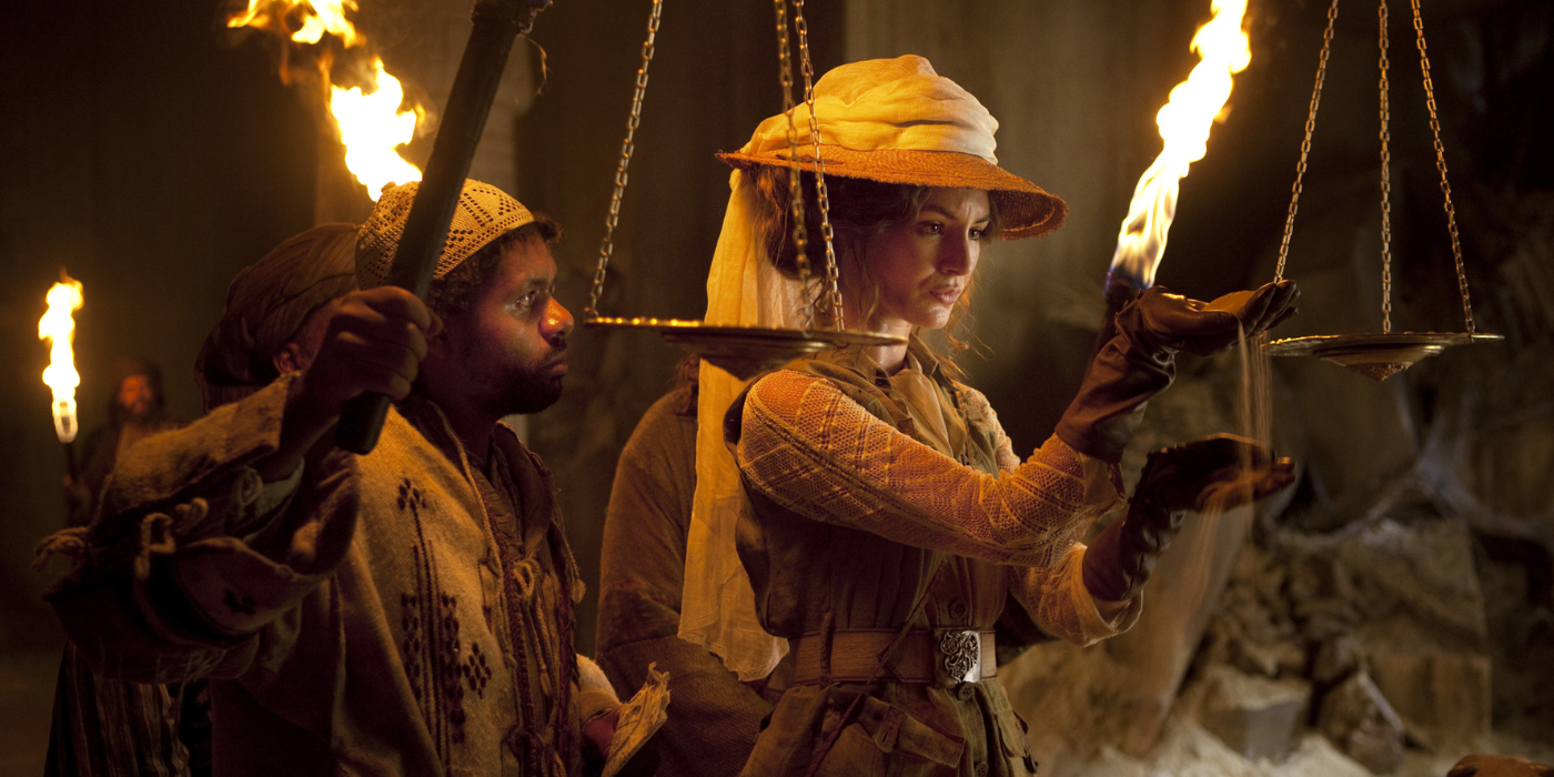 Louise Bourgoin as Adele Blanc Sec inspect the sands in Adventures of adele blanc sec