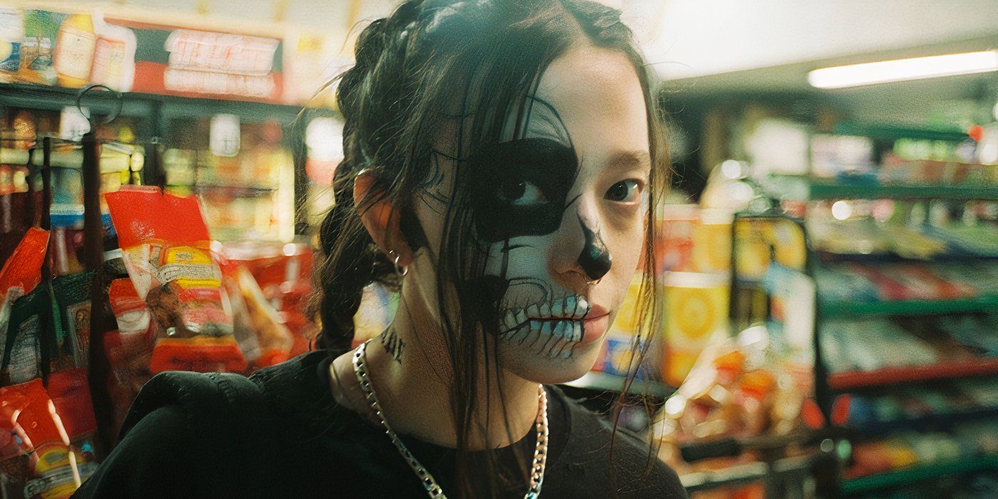 A young girl with skull makeup in a local store in All Souls