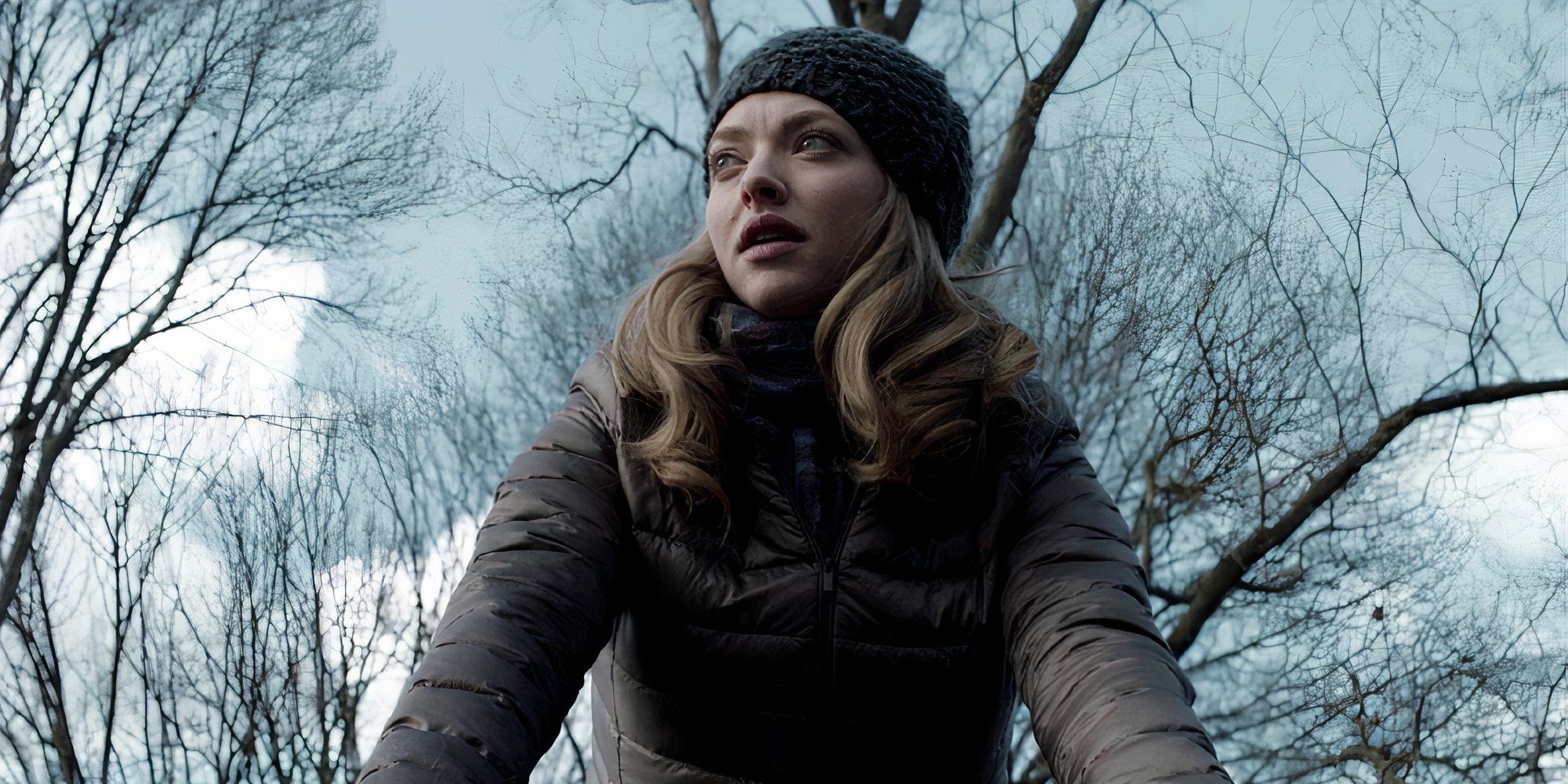 Amanda Seyfried as Mary Mensana in First Reformed riding a bike.